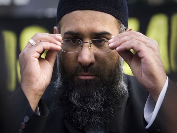 islamic preacher choudary addresses members of the media during a protest supporting the shari'ah law, in north london